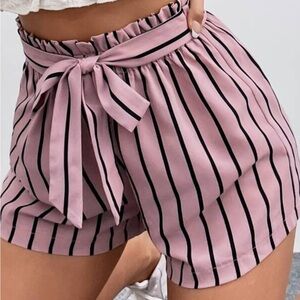 Purple/pink with black stripe shorts